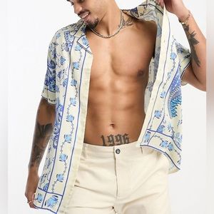 ASOS Design relaxed revere satin button up shirt with floral print